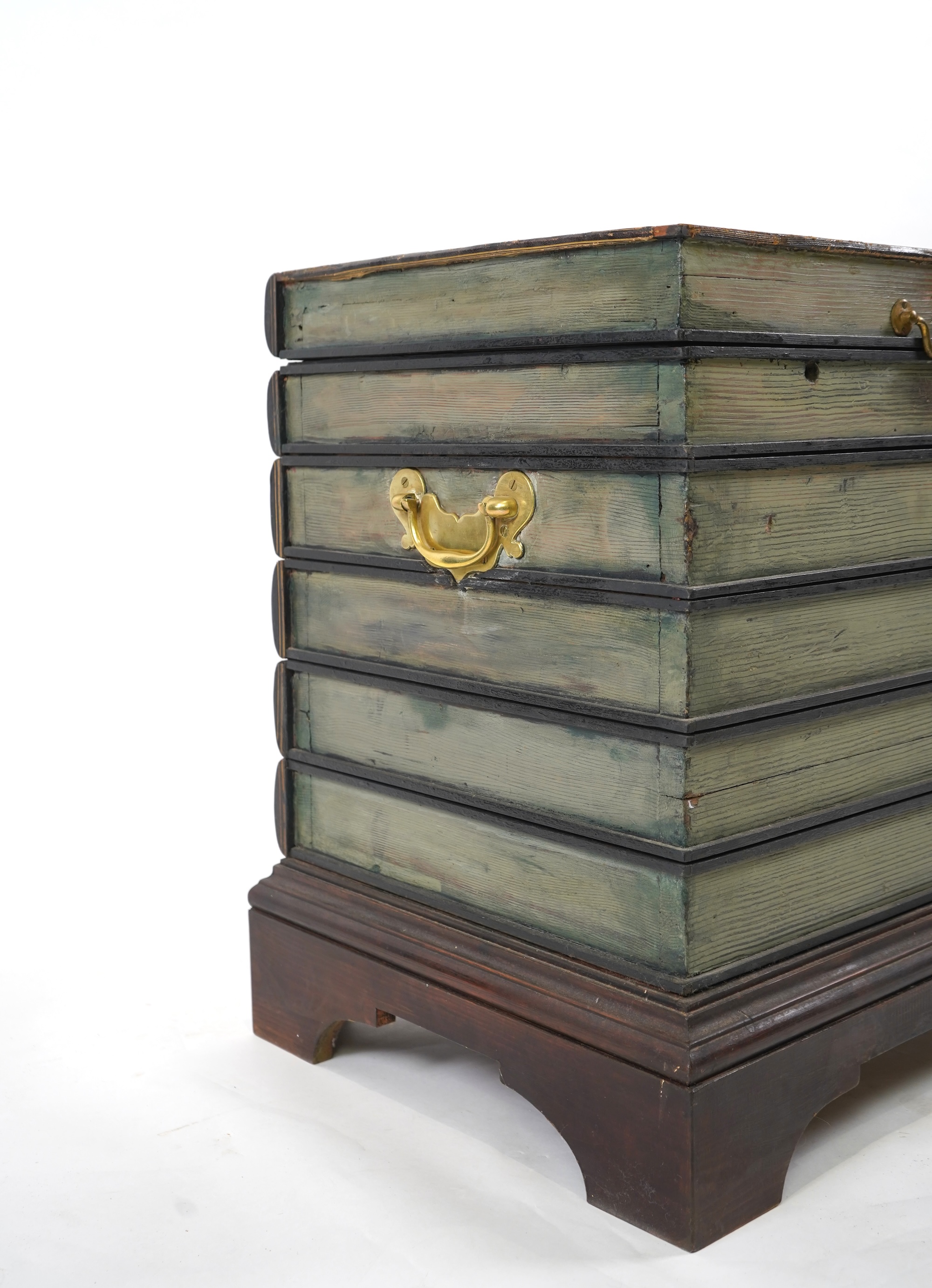 A Victorian style cellarette modelled as a stack of antiquarian books